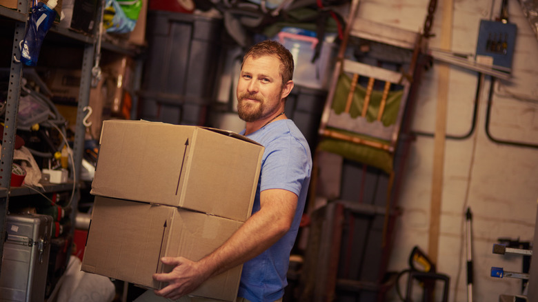Man tidying his garage