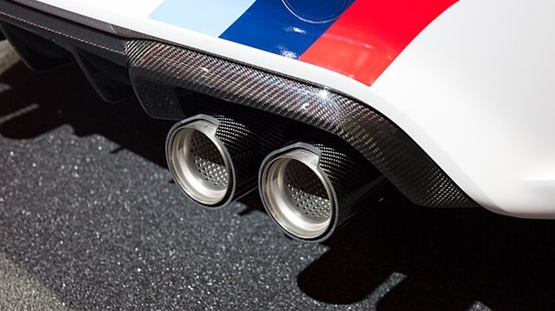 An aftermarket exhaust on a BMW M2