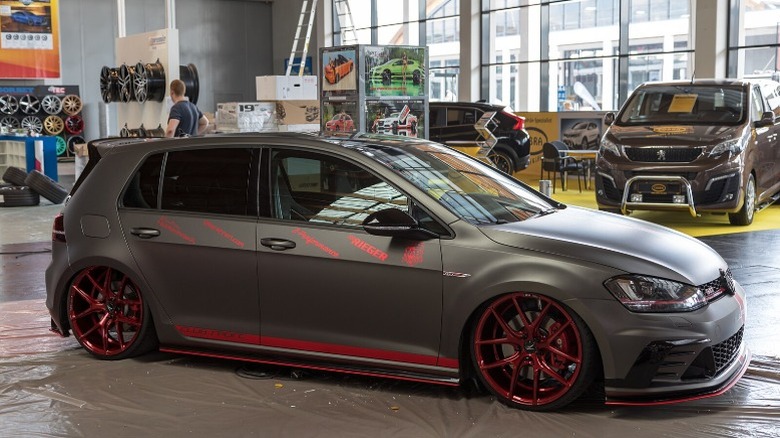 A modded VW Golf with lowered suspension