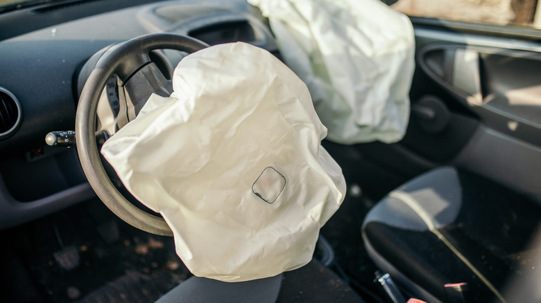 Car with deployed airbags after a crash