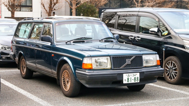 Volvo 245 wagon wearing Japanese license plates parked in lot, front-right 3/4 view