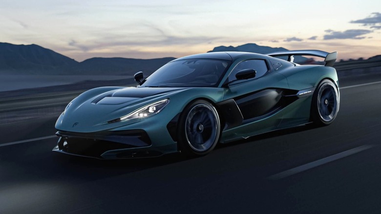 Green Rimac Nevera R on the road at dusk