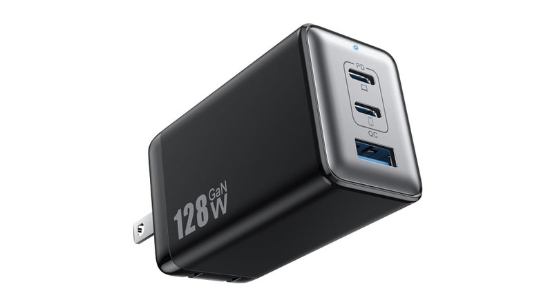 128 watt charger on white background