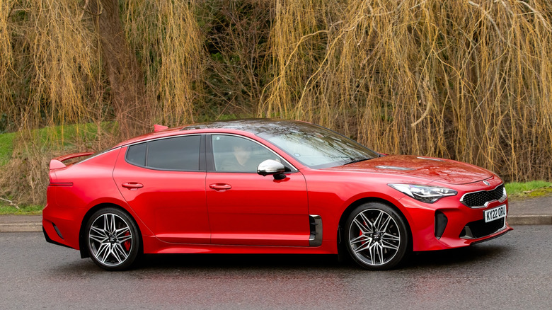 Kia Stinger GT driving on country road