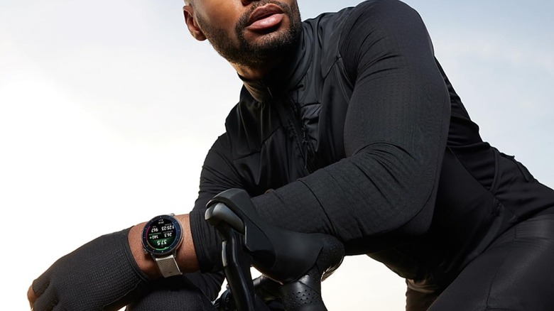 A person wearing the Galaxy Watch 7 while cycling