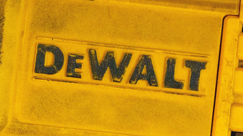 The DeWalt logo on the side of a tool.