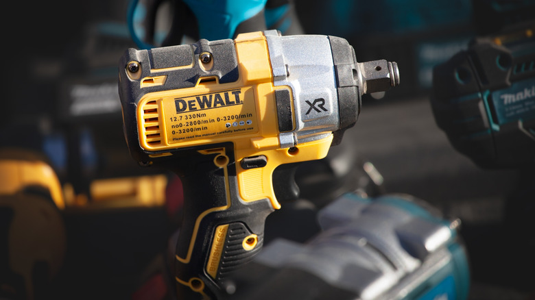 The DeWalt logo on the side of a tool.