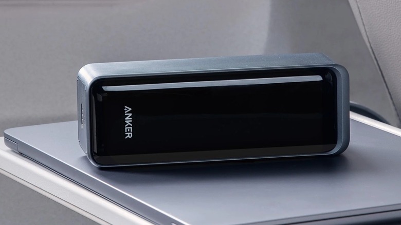 Picture showing Anker power bank sitting on top of a laptop