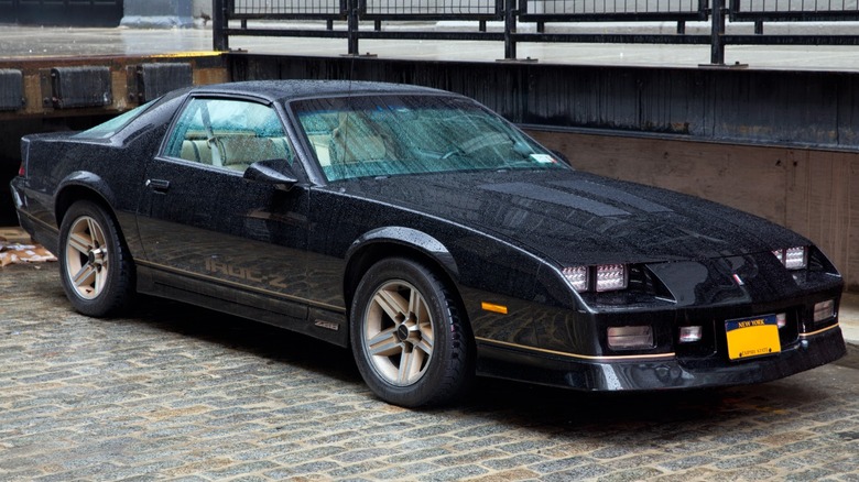 a black Chevrolet Camaro IROC-Z