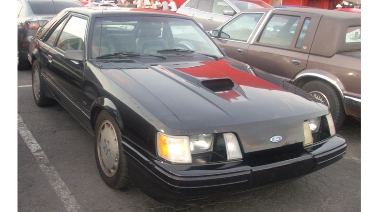 a black Ford Mustang SVO