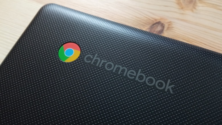 A closeup of a silver Chromebook