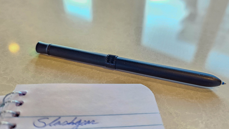 Skrikss Trio 93 pen posed on table