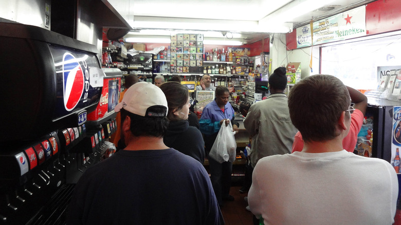 A phot of a busy gas station