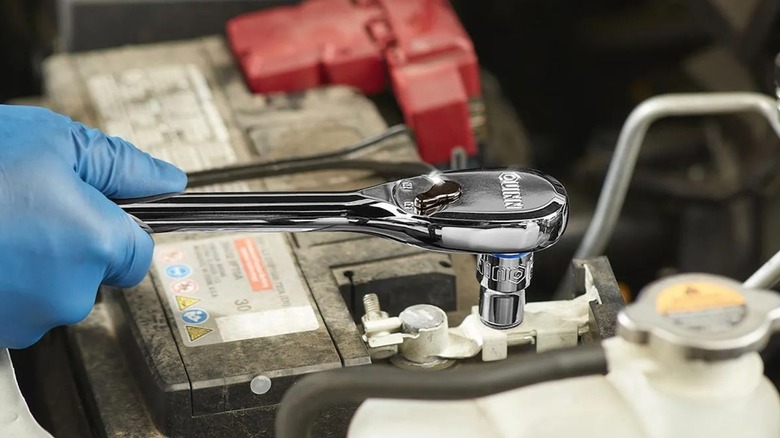 Quinn ratchet and socket in use on battery terminal