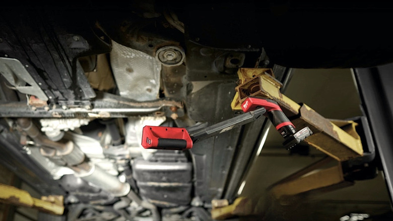 Milwaukee underbody light shining under a car