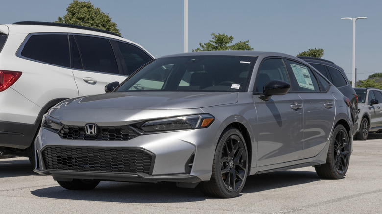 A Honda Civic parked on a lot.