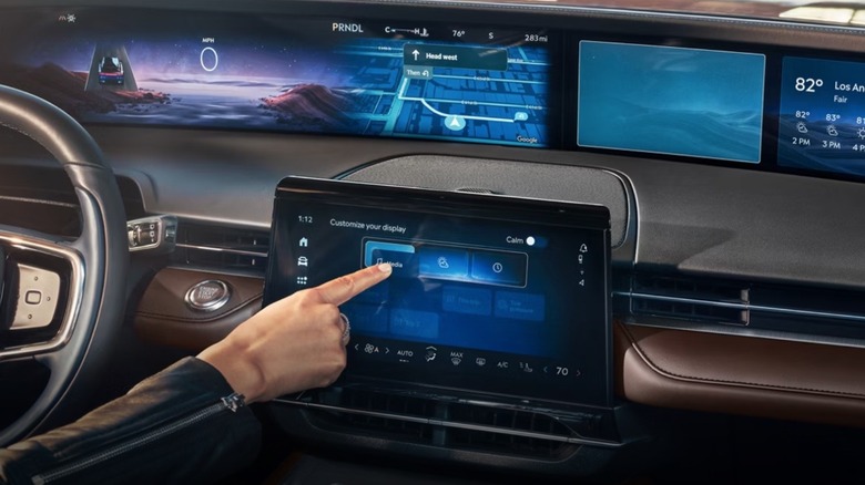 Person using Lincoln infotainment screen