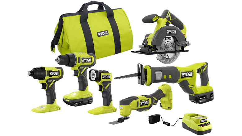 A combo pack of Ryobi power tools with a bag and battery