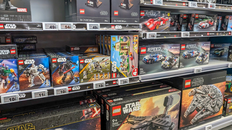 LEGO sets on the shelves waiting to be bought.