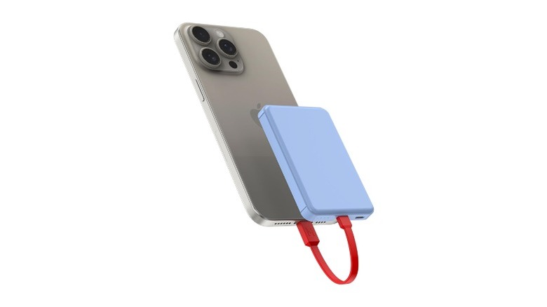 Grey iPhone with blue power bank and red charging cable