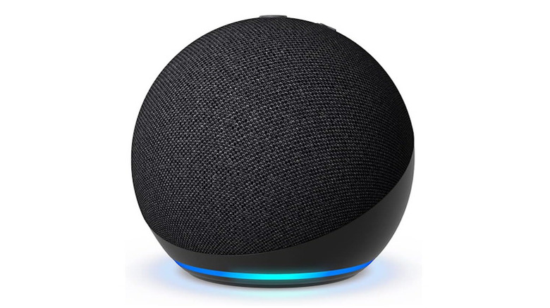 Amazon Echo Dot sitting up with a blue line on the bottom, on a white background