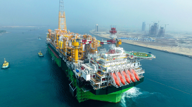 Egina FPSO being maneuvered from port