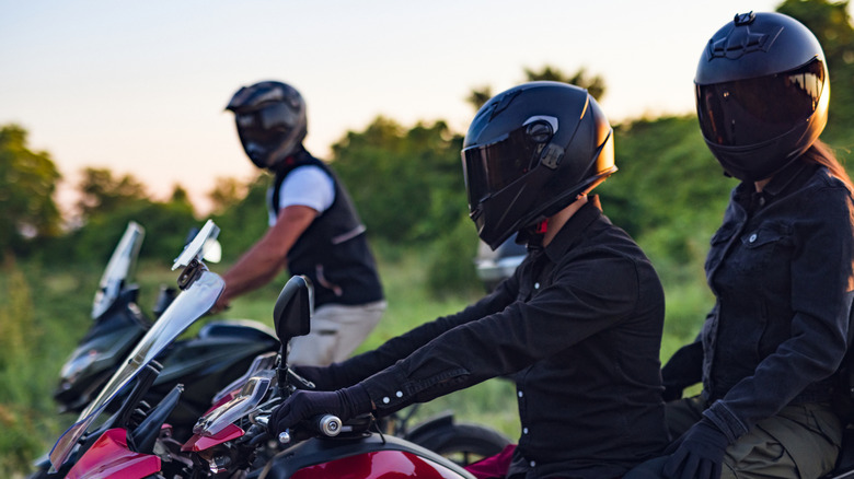 Group of motorcycle riders preparing for a ride