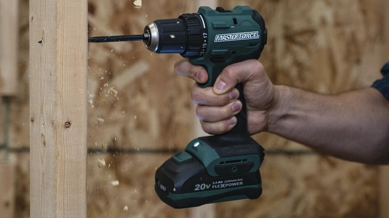 Masterforce drill being used on wood