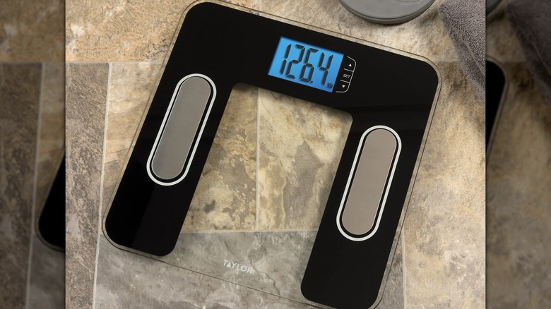 Taylor Smart Body Composition Scale displays 126.4 lb. weight