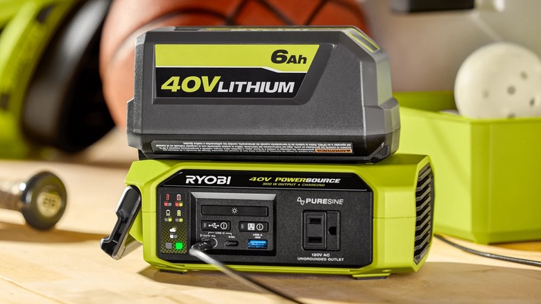 40V One+ 300W Power Source on table with battery