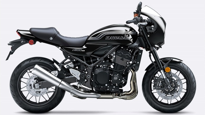 A sleek black Kawasaki Z900RS, styled like a retro sport bike with a modern café-fairing twist.