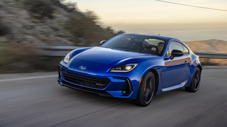 Blue 2024 Subaru BRZ on mountain road