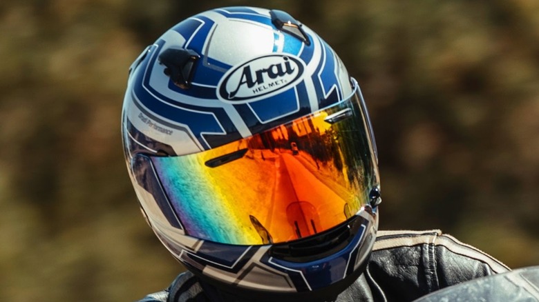 Motorcyclist wearing Arai helmet