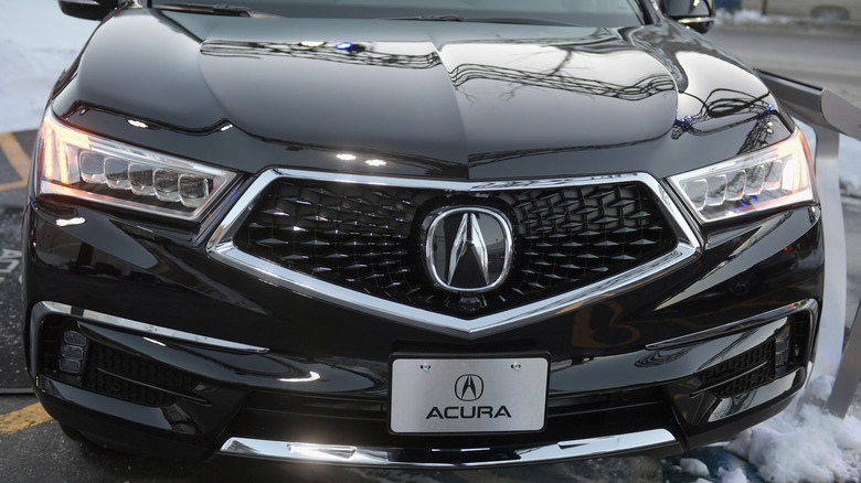 Front end of a black 2018 Acura MDX.