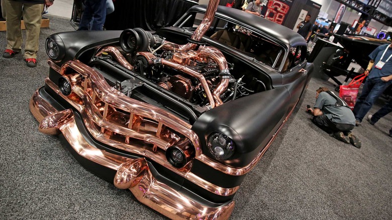 A 1950 Cadillac in deep black paint with 6BT Cummins engine