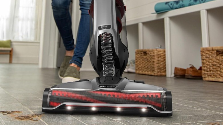 Close up of Hoover ONEPWR Evolve Pet Elite cleaning tile floor