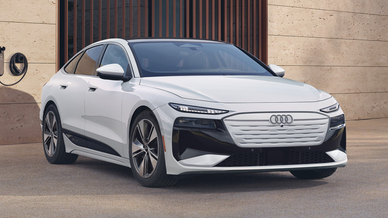 Audi A6 Sportback e-tron parked at a house