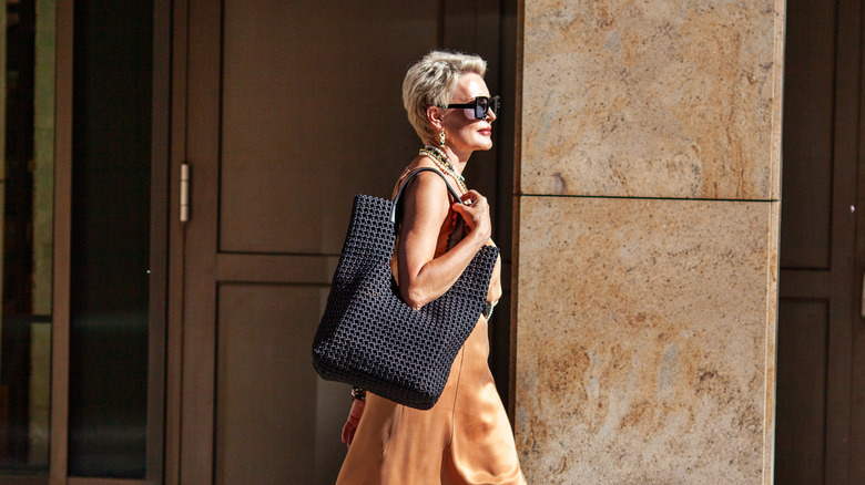woman walking with handbag