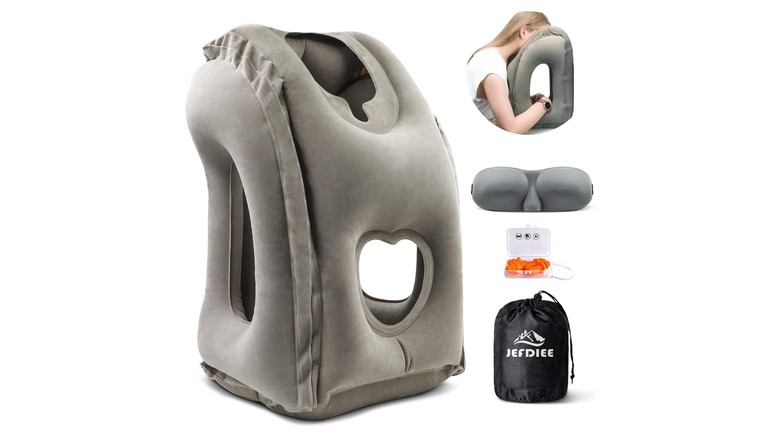 person using travel pillow