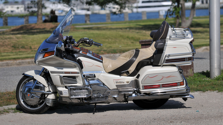 A cream classic Honda Gold Wing parked at the Nautical Mile section in New York