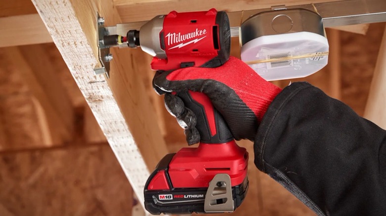 M18 Compact ¼-inch Hex Impact Driver in use