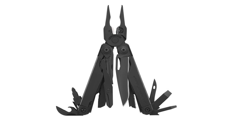 Black Leatherman Surge multi-tool with pliers and tools out on a white background