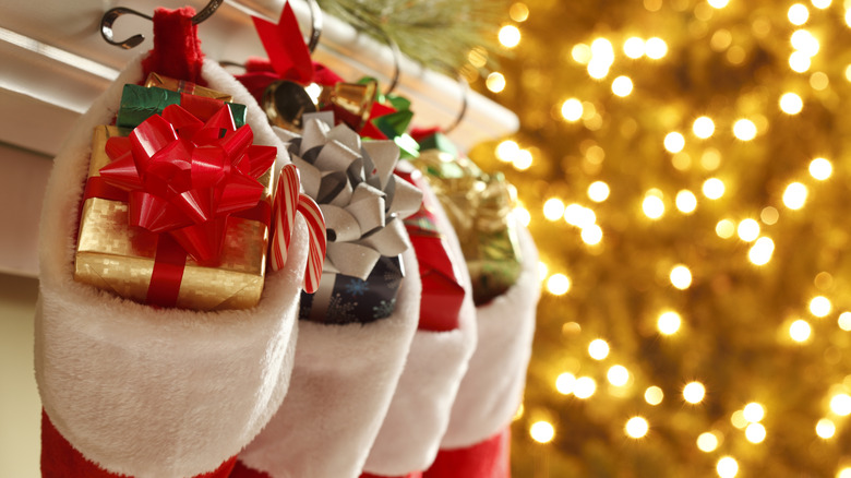 Pictures showing Christmas stockings with presents inside