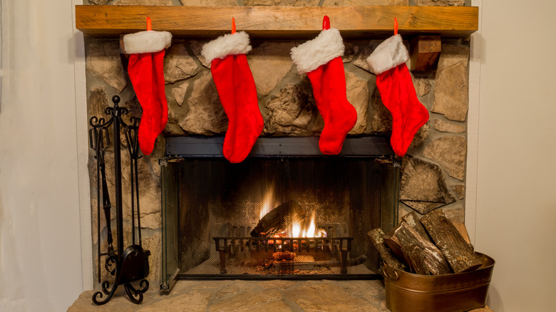 Christmas stocking hanging over a fireplace