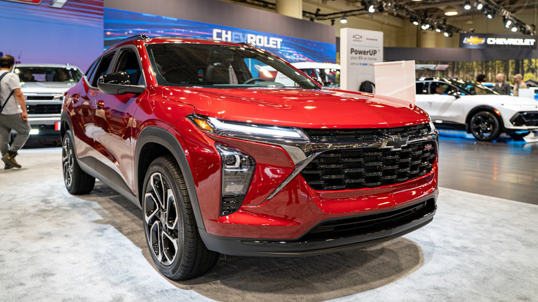 Red Chevrolet Trax in a Chevrolet showroom