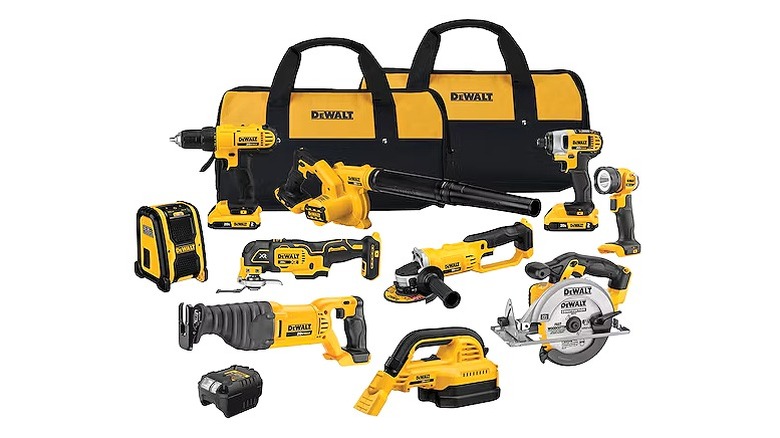 many DeWalt power tools and accessories with two DeWalt bags