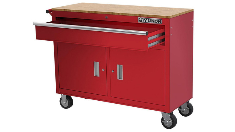 red yukon workbench with cabinets and drawer
