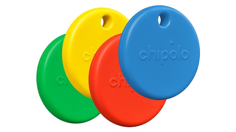 Four Chipolo trackers in green, yellow, red, blue