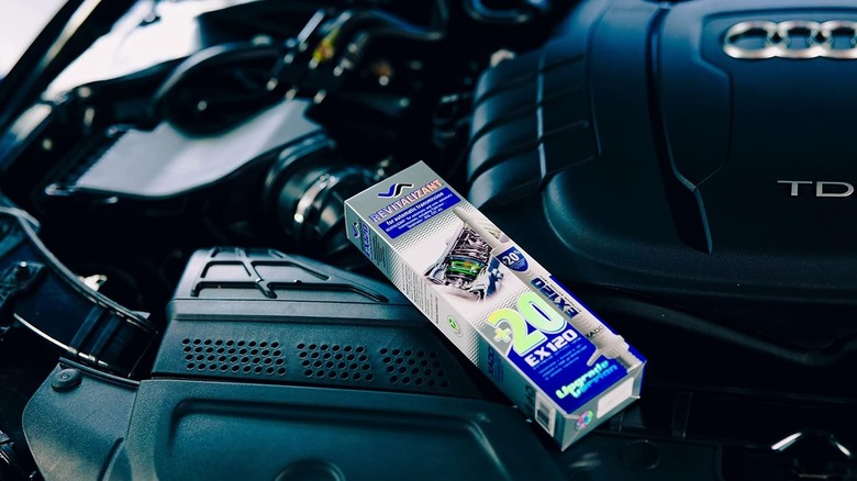 XADO automatic transmission additive box in a car hood