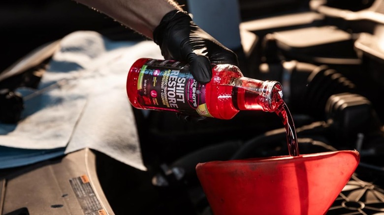 Pouring Hot Shot's Secret Shift Restore